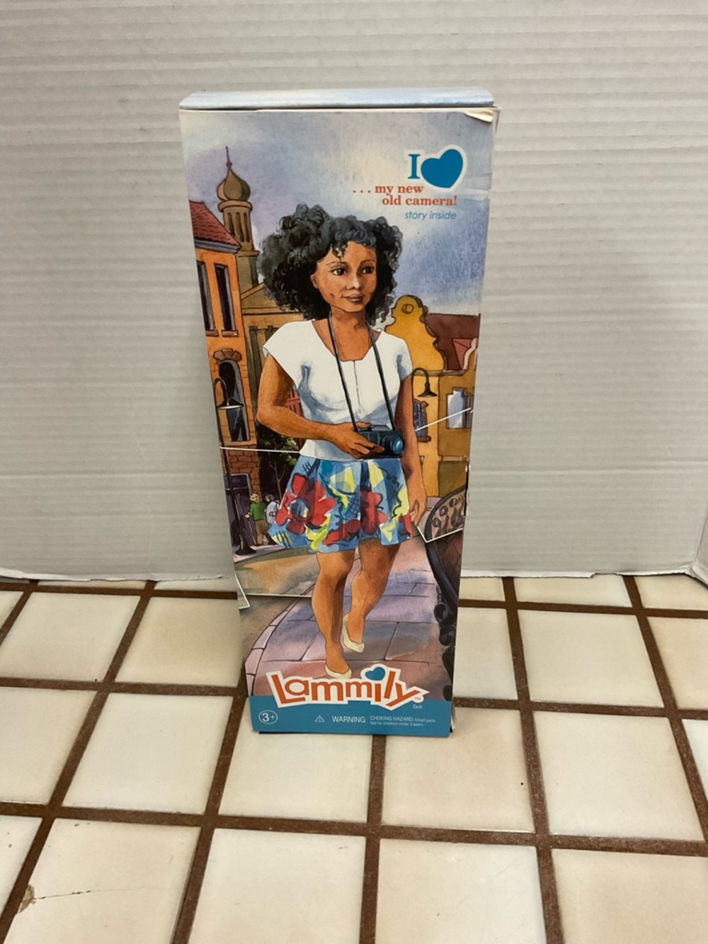 Doll - Curly Black Hair in White Top & Floral Skirt